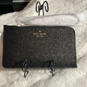 Brand new Kate Spade black shimmer wristlet. Great for date night.
